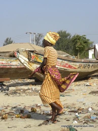 Africa woman shopping on the beach